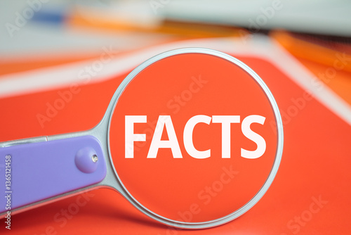 facts text magnifying glass background