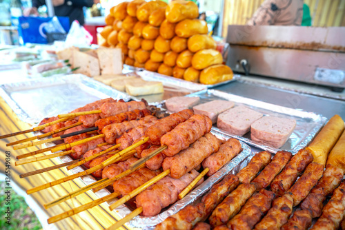 Obraz na płótnie Nem lui fue, grilled minced pork sausages on lemongrass skewers, Vietnamese cuisine w salonie