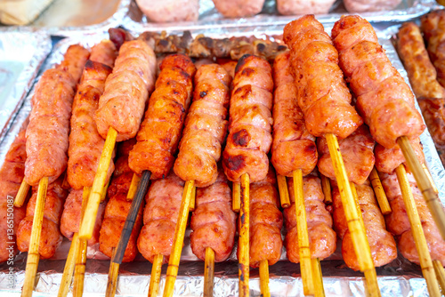 Obraz na płótnie Nem lui fue, grilled minced pork sausages on lemongrass skewers, Vietnamese cuisine w salonie