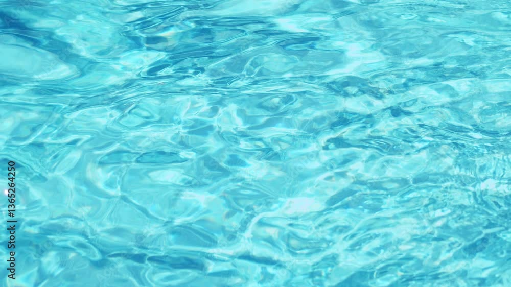 Ripples on the water of the pool. Transparent, sparkling and inviting surface of the water in motion. View from above. slow motion and looped video. Ripples on the water of the pool. Transparent, sparkling and inviting surface of the water in motion. View from above. slow motion and looped video.