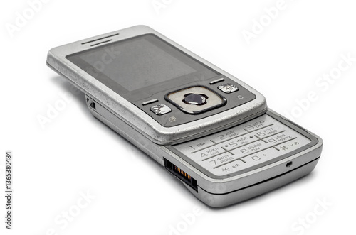 Wallpaper Mural Old flip mobile phone in open position on white background for nostalgic display Torontodigital.ca