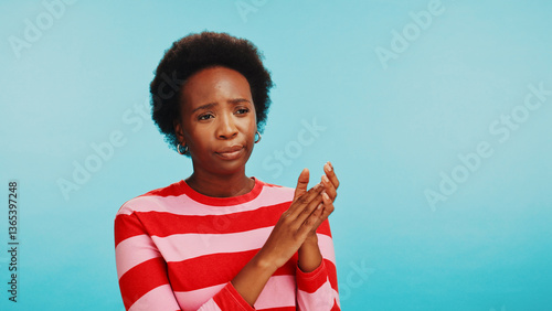 Quadro su tela Annoyed, clapping hands and black woman in studio with sarcasm, bored and irritated expression