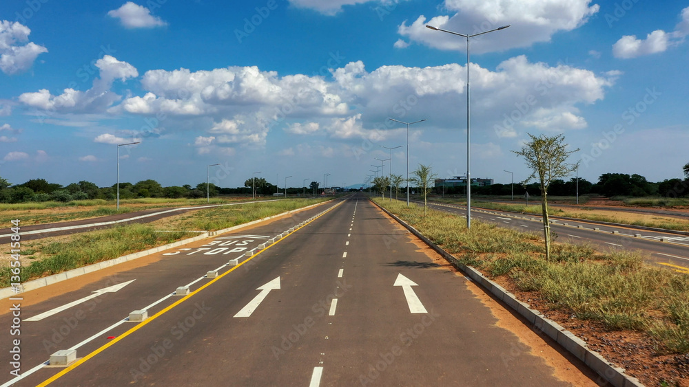 Fototapeta premium aerial view, national road network, botswana, gaborone, intersection on the highway, african infrastructure