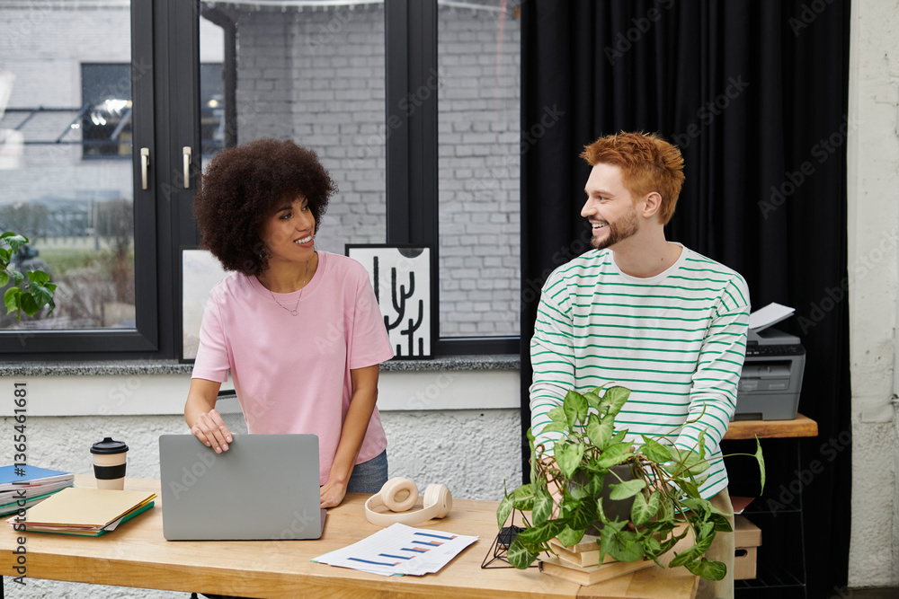Two friends packing and unpacking items in a modern workspace before a big move Two friends packing and unpacking items in a modern workspace before a big move