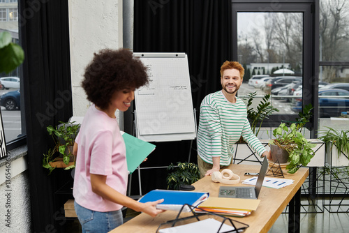 Картината върху платно Bright and airy workspace fosters teamwork during moving and packing preparation