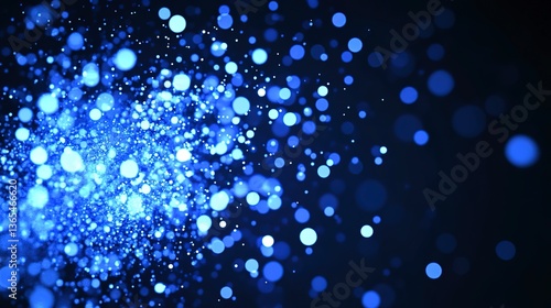 A mesmerizing cosmic dust cloud explodes with vibrant blue energy, shimmering with countless tiny lights against a deep black backdrop.