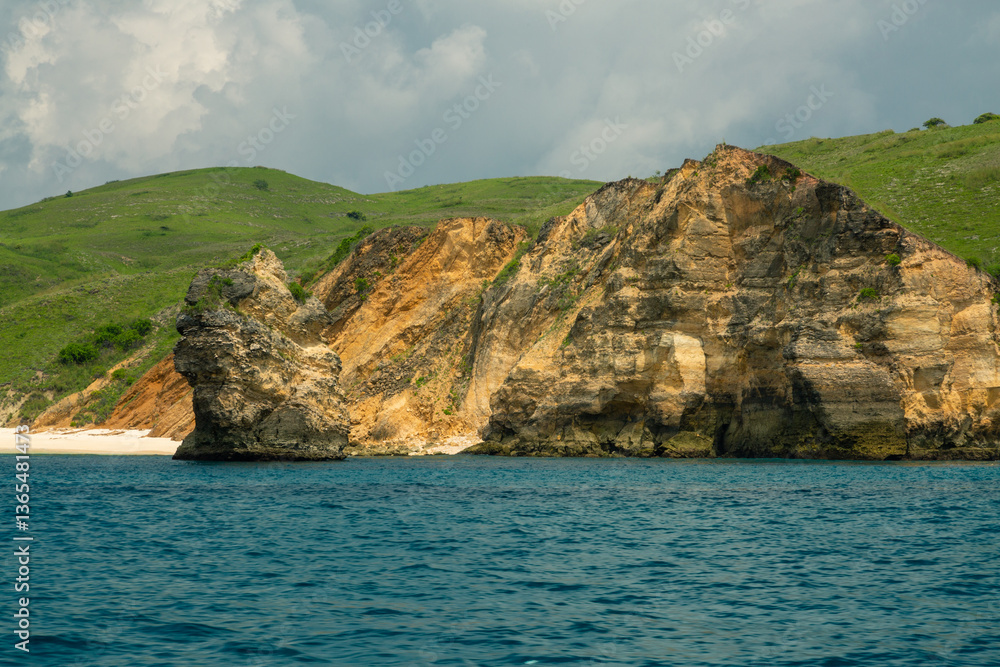 Fototapeta premium View of a steep sea cliff on an island in Indonesia