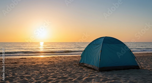 Camping tent by the beach at sunset  