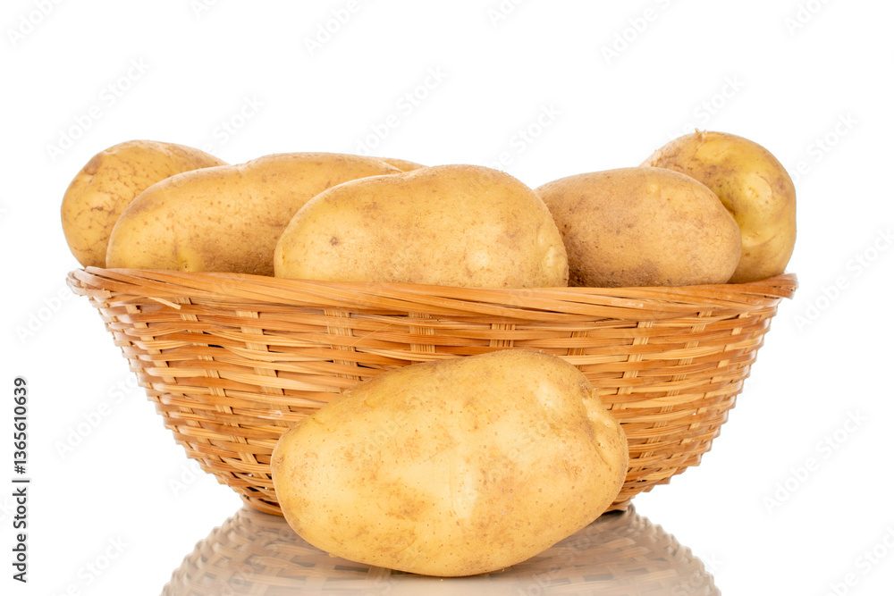 Unpeeled raw potatoes with kitchen utensils isolated on white background, close-up. Unpeeled raw potatoes with kitchen utensils isolated on white background, close-up.