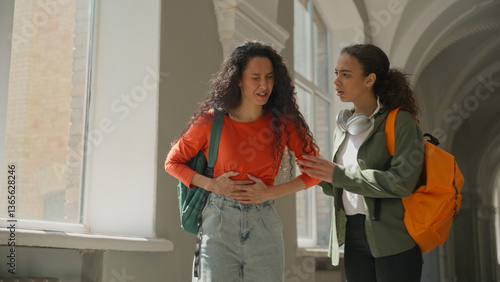 Photos Two students girl Hispanic women Latina female friends in university college wal