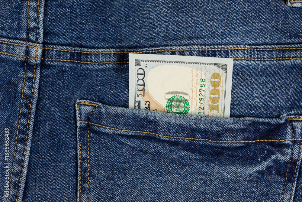 100 dollars are in the pocket of jeans. savings. theft of money. bribe. passive income. 100 dollars are in the pocket of jeans. savings. theft of money. bribe. passive income.