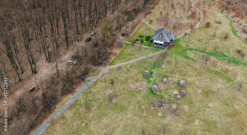 Aerial landscape of a romanian old village household in the Carpathians, Transylvania, Romania, Europe	
