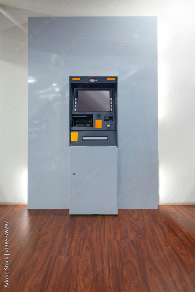 The front view of the ATM (Automatic cash machine) with screen and buttons is on the building wall. Concept of technology, finance, and banking The front view of the ATM (Automatic cash machine) with screen and buttons is on the building wall. Concept of technology, finance, and banking