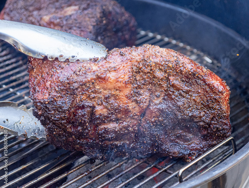 Foto Prime beef picanha steak being cooked on a grill