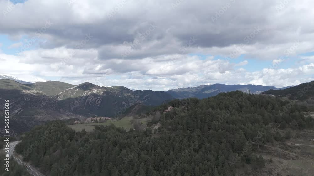 Wide aerial view of a majestic snow-capped mountain peak dramatic sky clouds evergreen forests rugged terrain wilderness natural beauty awe. Wide aerial view of a majestic snow-capped mountain peak dramatic sky clouds evergreen forests rugged terrain wilderness natural beauty awe.