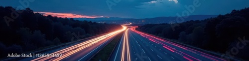 Forking highway at night, illuminated crossroads; decision point , challenge, speed