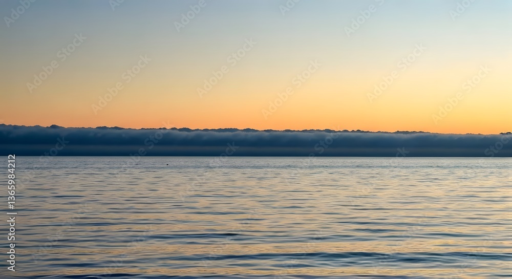 Fototapeta premium A misty dawn with soft, low-hanging clouds over a tranquil sea, AI Generated