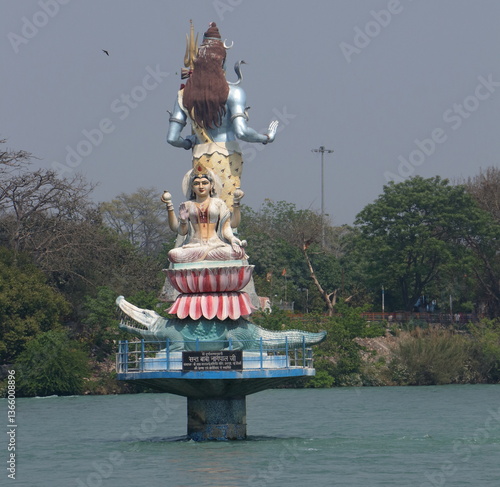 Statue of Maa Ganga in the middle of the river Ganges in Haridwar, a religious city in Uttarakhand and a beautiful view of the river Ganges. Haridwar.