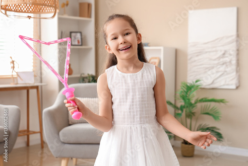 Cute little girl making soa...