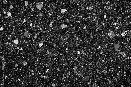 Black glitter background with silver sparkles