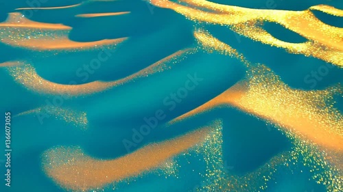 An abstract aerial view captures the mesmerizing patterns of the ocean meeting the coast, the dance of sun over water and the earth 