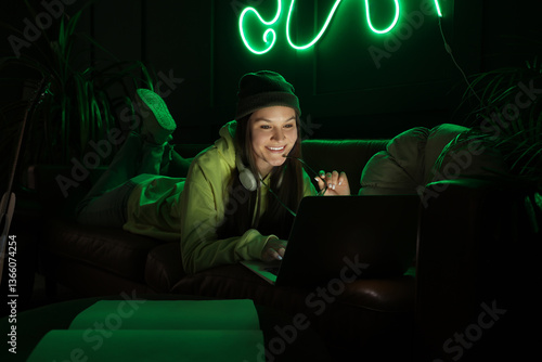Young woman with headphones...