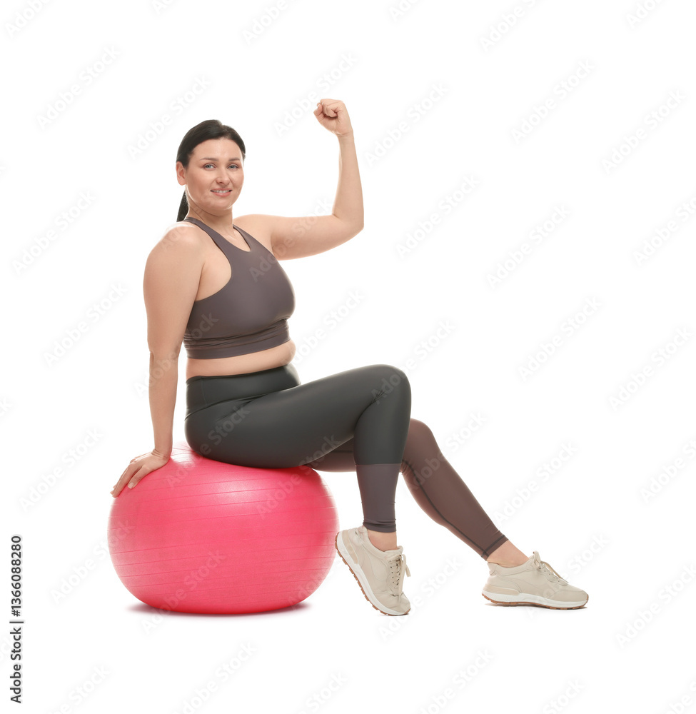 Fototapeta premium Plus size woman in gym clothes with fitness ball on white background
