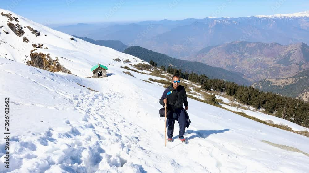 solo hiker exploring snowy mountain trails in the morning solo hiker exploring snowy mountain trails in the morning