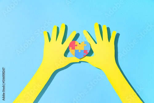 Paper hands holding colorfu...