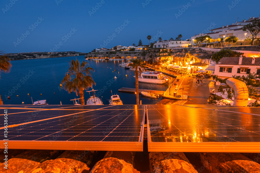 El Castell Menorca after sunset. View of the old port and the waterfront full of restaurants and pubs, city scape. Travel concept. Spain tourist attractions