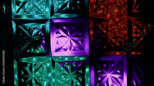Kaleidoscope made of glass pattern with multi-colored illumination.