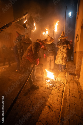young people holding torches during the celebration of el vitor, in the town of mayorga, Valladolid on september 27 as every year.