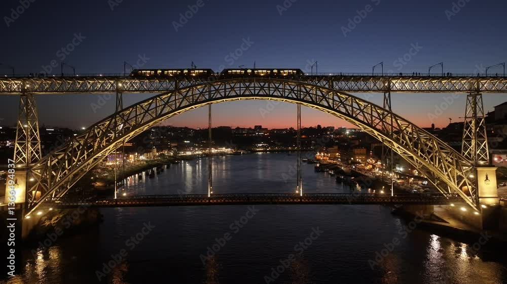 Sunset Luis I Bridge At Porto In Porto District Portugal. Sunset City Scene. Illuminated Bridge Landscape. Luis I Bridge At Porto District Portugal. Beautiful Dusk Skyline. Sunset Luis I Bridge At Porto In Porto District Portugal. Sunset City Scene. Illuminated Bridge Landscape. Luis I Bridge At Porto District Portugal. Beautiful Dusk Skyline.