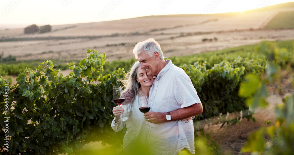 Fototapeta premium Love, hug and wine with old couple in vineyard for romance, anniversary date and bonding. Happiness, retirement and support with senior man and woman at winery for embrace, relax and vacation
