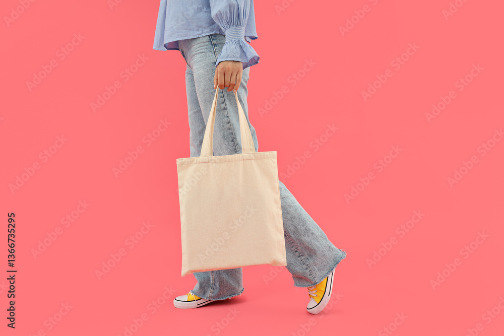 Attractive young girl with a bag in her hands