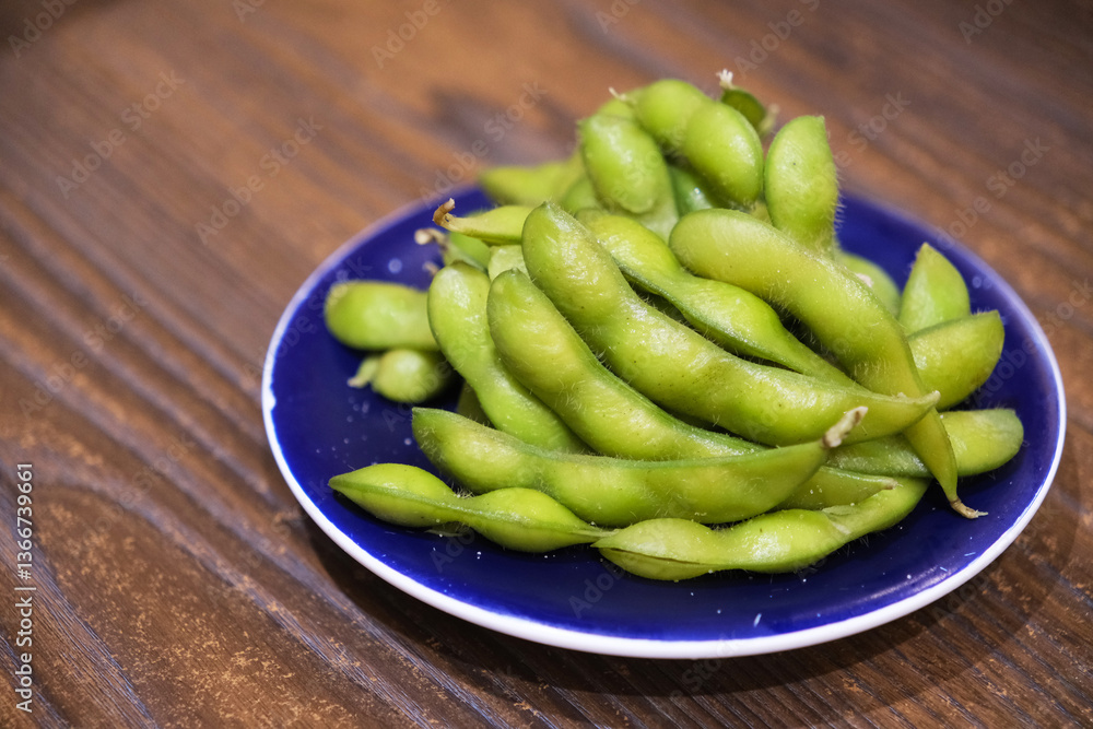boiled Edamame food on table. side dish in Japanese cuisine boiled Edamame food on table. side dish in Japanese cuisine