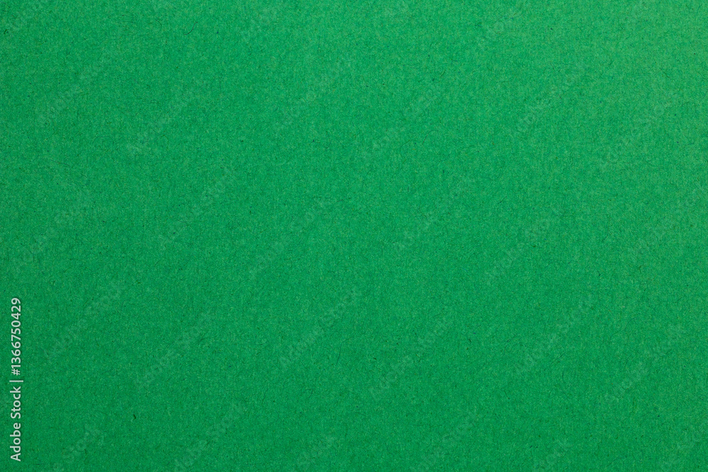 A green background with a green color, textured origami paper backdrop A green background with a green color, textured origami paper backdrop