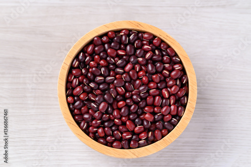Azuki beans or red mung beans in wooden bowl on white background, Food ingredient, Top view