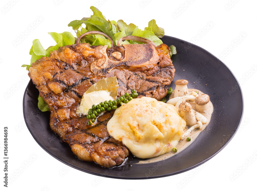 T-Bone Beef Steak In black plate. Beef Steak Dinner. isolated on transparent background