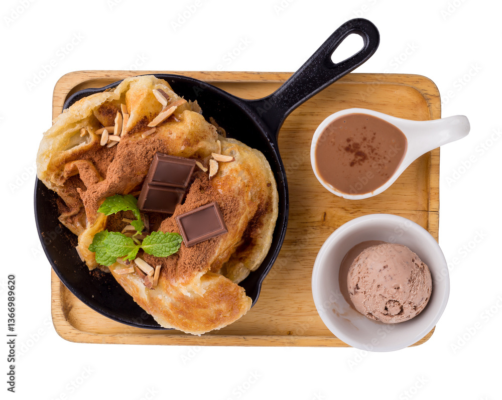 Fried roti topping with chocolate and chocolate power isolated on a transparent background.