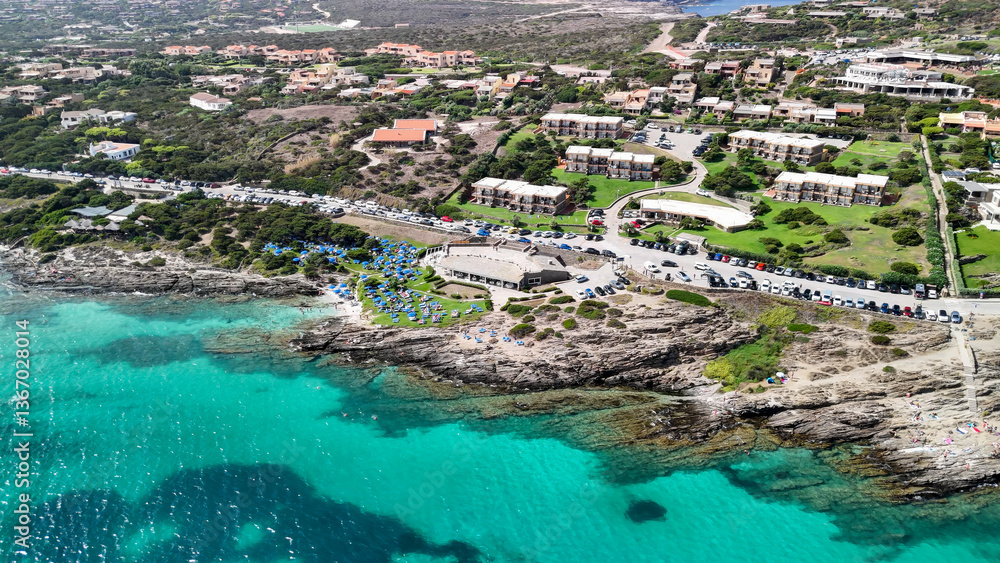 Aerial perspective of Sardinia's Torre della Pelosa and crystal-clear waters of La Pelosa Beach