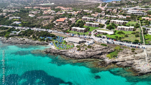 Aerial perspective of Sardinia's Torre della Pelosa and crystal-clear waters of La Pelosa Beach