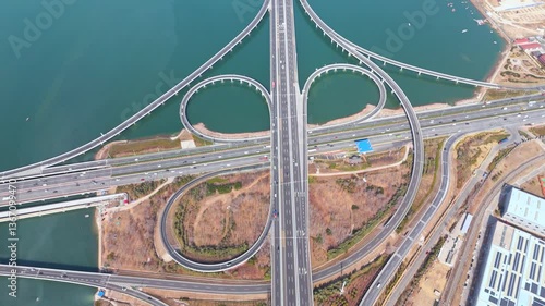 4k Video Qingdao Landmark Jiaozhou Bay Bridge Traffic Aerial Photography Captures Stunning Roadway Design and Vibrant Waterways