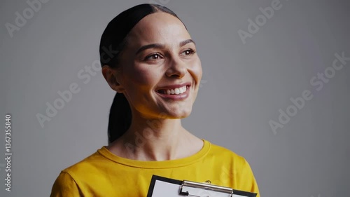 The Smiling Woman with Clipboard