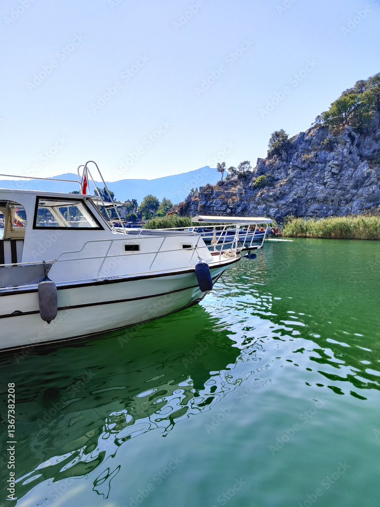 Fototapeta premium a beautiful ship is sailing in the blue sea