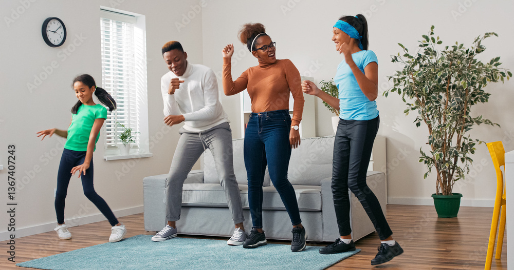 Fototapeta premium A lively couple with their daughters throws a dance party in their apartment. They move with rhythm, sing along, and laugh, spending quality family time.