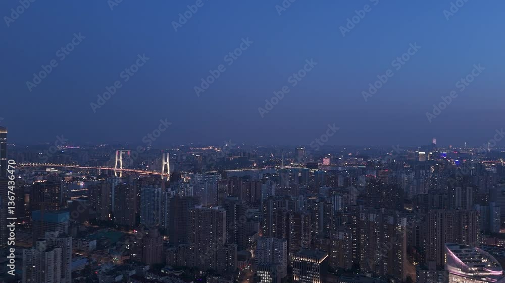 4K real time Aerial view of Shanghai financial buildings and winding river at night. 4K real time Aerial view of Shanghai financial buildings and winding river at night.
