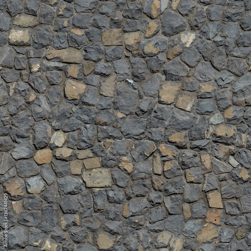 Seamless stone texture of gray rockface bluestone rubble wall cladding