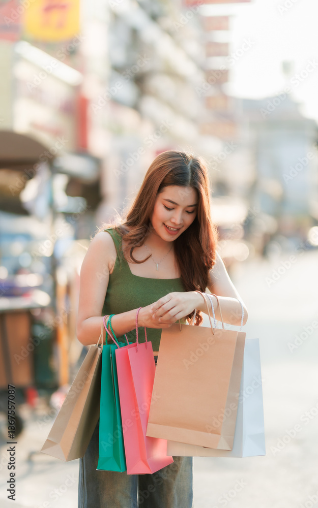 A beautiful woman joyfully shops in a lively mall, carrying multiple bags and enjoying the vibrant atmosphere of colorful stores and bright lights. A beautiful woman joyfully shops in a lively mall, carrying multiple bags and enjoying the vibrant atmosphere of colorful stores and bright lights.