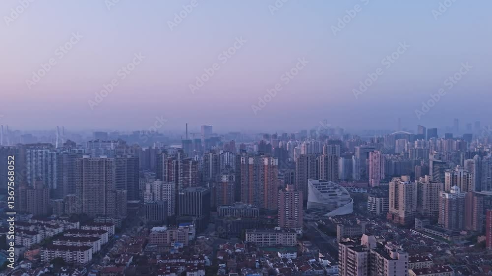 4K real time Aerial view of Shanghai modern buildings and traditional residential buildings at sunrise. 4K real time Aerial view of Shanghai modern buildings and traditional residential buildings at sunrise.